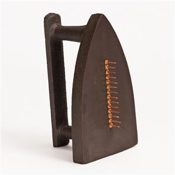 MAN RAY Cadeau.